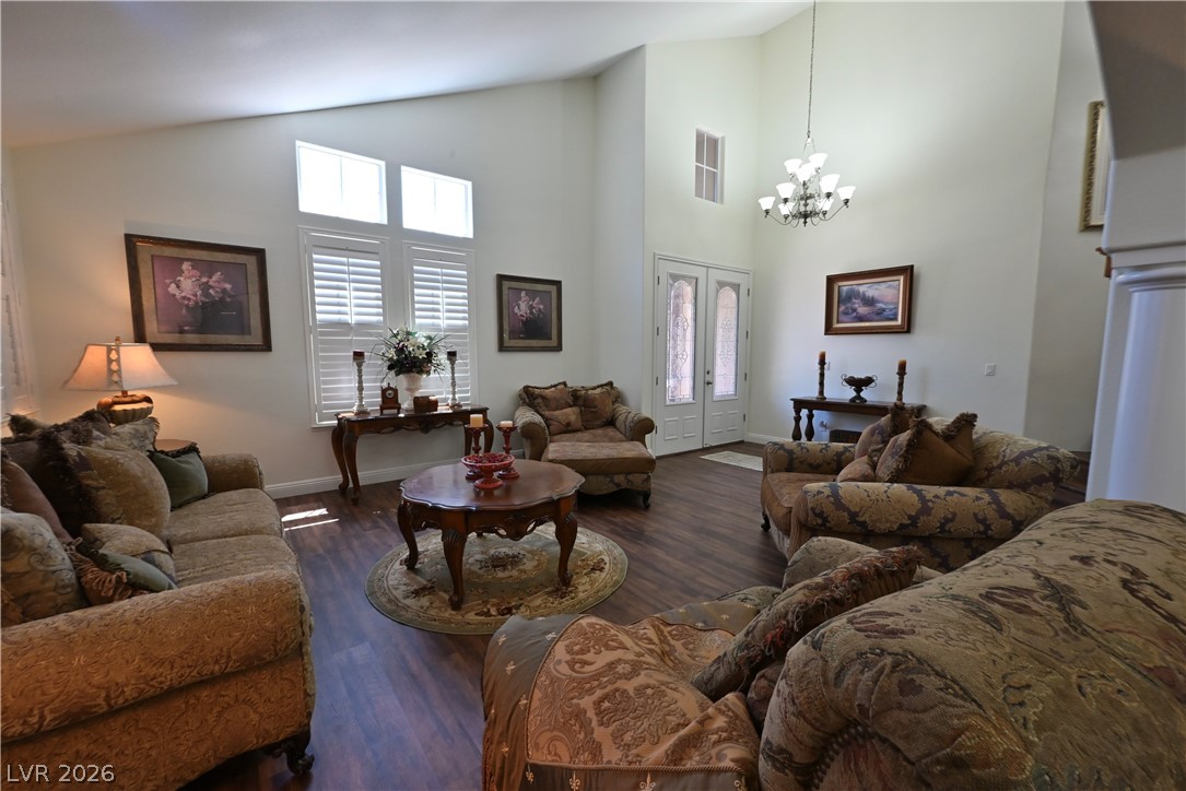 2729 Kildrummie Street Henderson, NV 89044 - Photo 13 of 42 The soaring ceilings and abundant natural light create an open, airy atmosphere in this inviting living space.