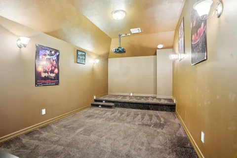 a view of a workspace with furniture and wooden floor