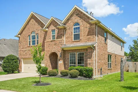 a bedroom with bed and a window