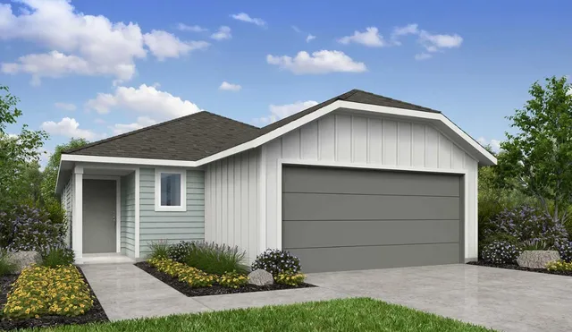 a front view of house with yard and green space