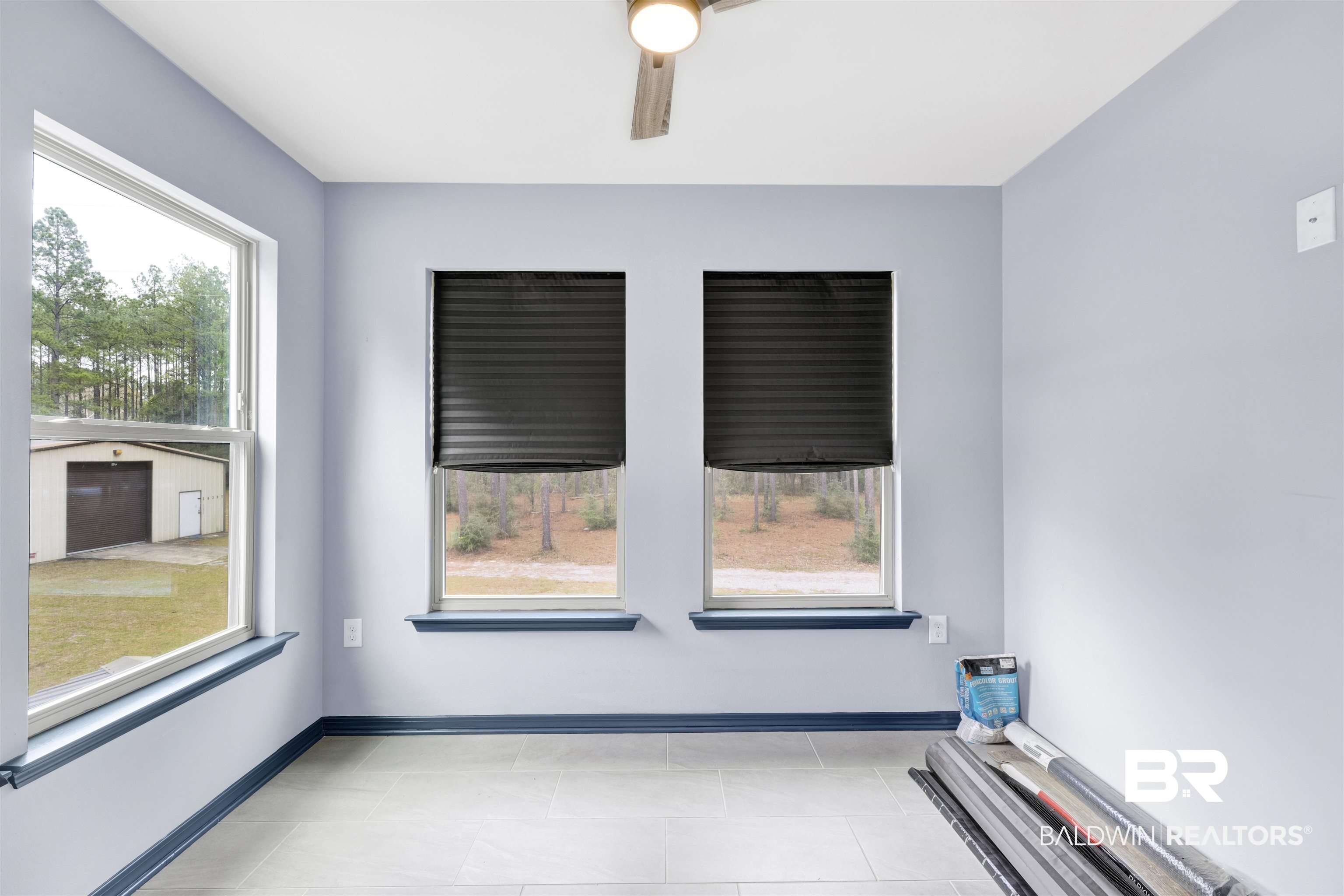 36397 Alexandria Trail Stapleton, AL 36578 - Photo 40 of 65 Unfurnished room with a ceiling fan and light tile patterned floors