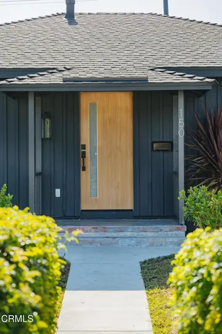 a view of backyard with cabin