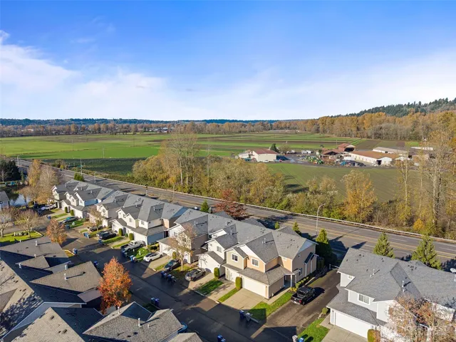 an aerial view of a city with ocean view