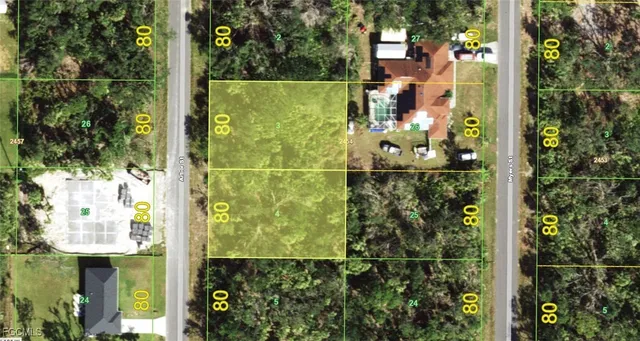 a bathroom with a glass shower door and a sink