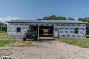 515 Norris Road Fort Denaud, FL 33935 - Photo 6 of 20 a view of a car park in front of house