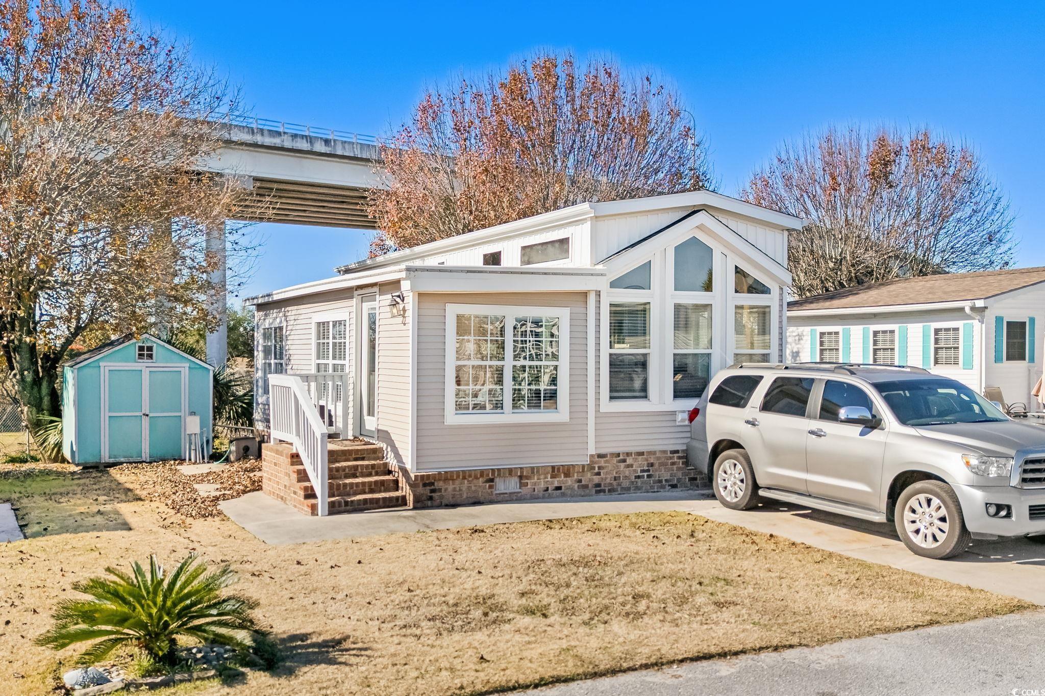 137 Riptide Circle North Myrtle Beach, SC 29582 - Photo 2 of 32 View of front of home with a storage unit
