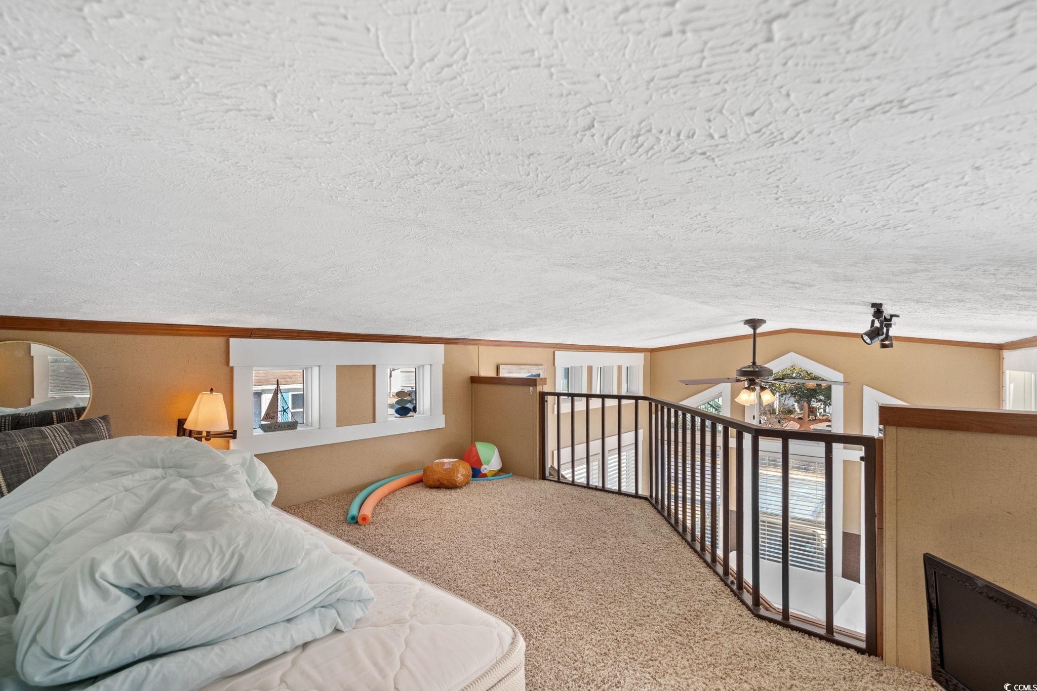 137 Riptide Circle North Myrtle Beach, SC 29582 - Photo 21 of 32 Carpeted bedroom with ornamental molding