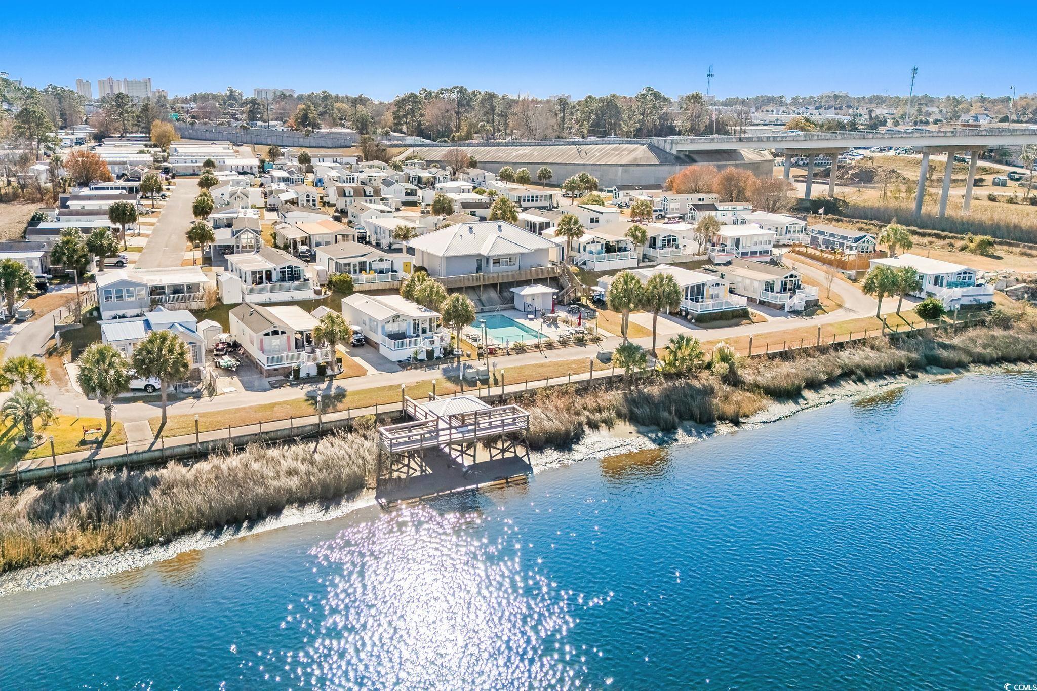 137 Riptide Circle North Myrtle Beach, SC 29582 - Photo 28 of 32 Aerial view of residential area featuring a large body of water
