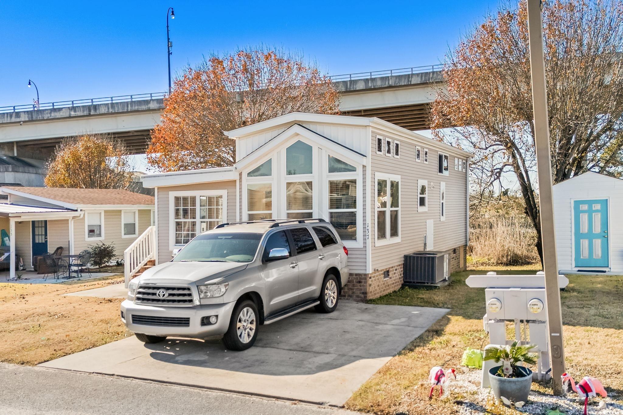 137 Riptide Circle North Myrtle Beach, SC 29582 - Photo 3 of 32 View of front of house with an outdoor structure