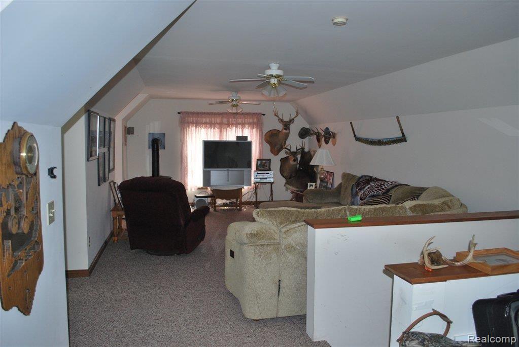 1985 Haines Road Lapeer, MI 48446 - Photo 12 of 21 Man Cave above garage.JPG
