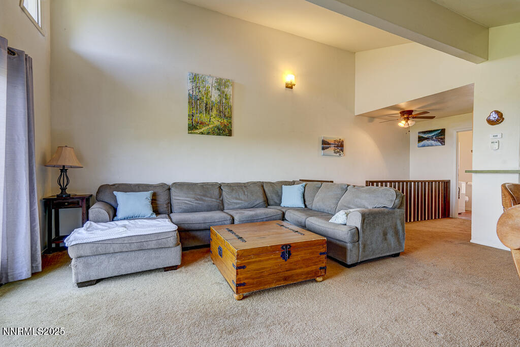 710 Tina Court, Unit B2 Stateline, NV 89449 - Photo 11 of 25 a living room with furniture and a lamp