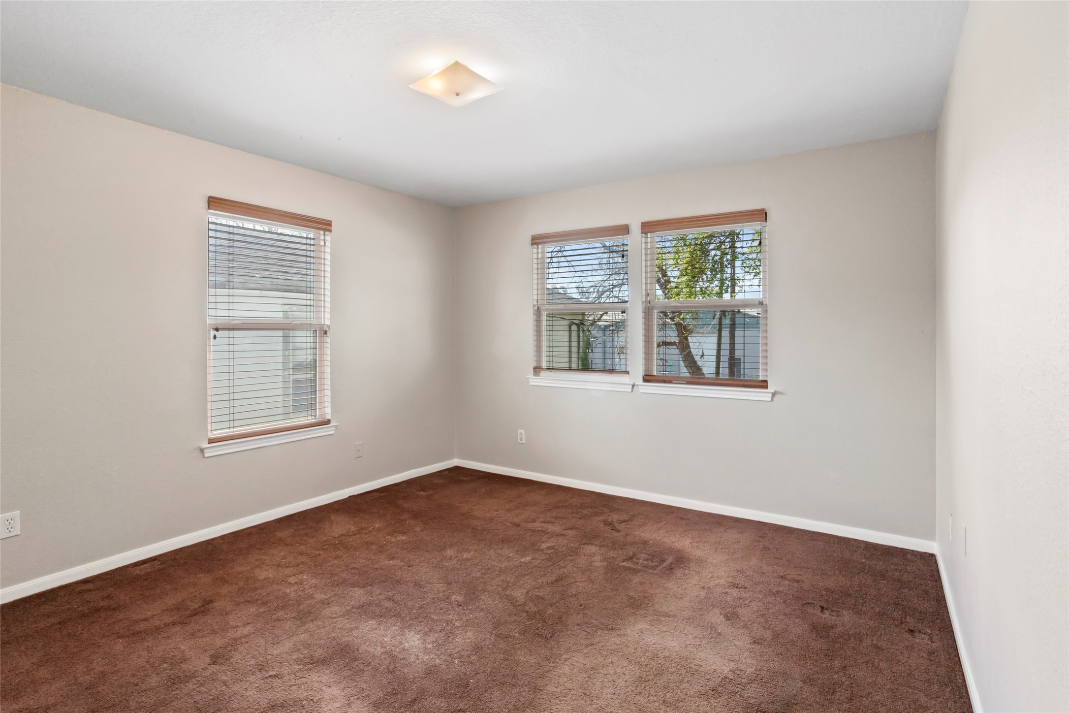 3105 Garrow Street Houston, TX 77003 - Photo 14 of 26 One of three bedrooms located upstairs.