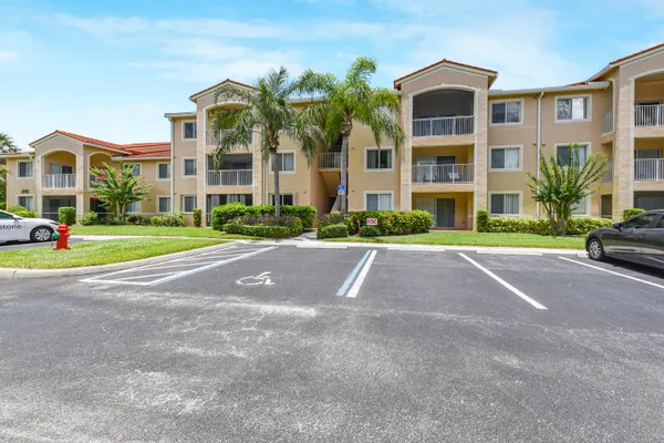 a view of multiple houses with a yard