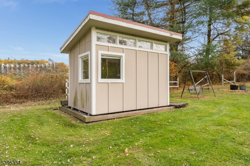 383 Pittstown Road Pittstown, NJ 08867 - Photo 22 of 29 a front view of a house with garden