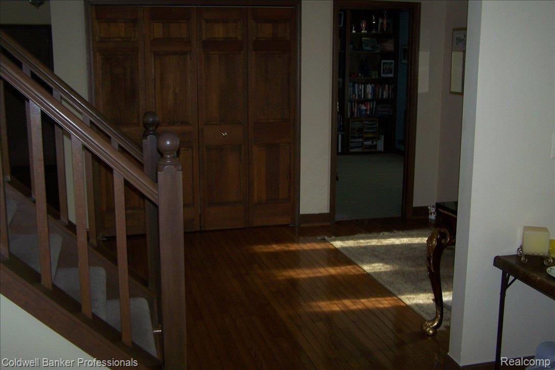 46700 Strathmore Road Plymouth, MI 48170 - Photo 11 of 21 FOYER WITH HARDWOOD FLOORS