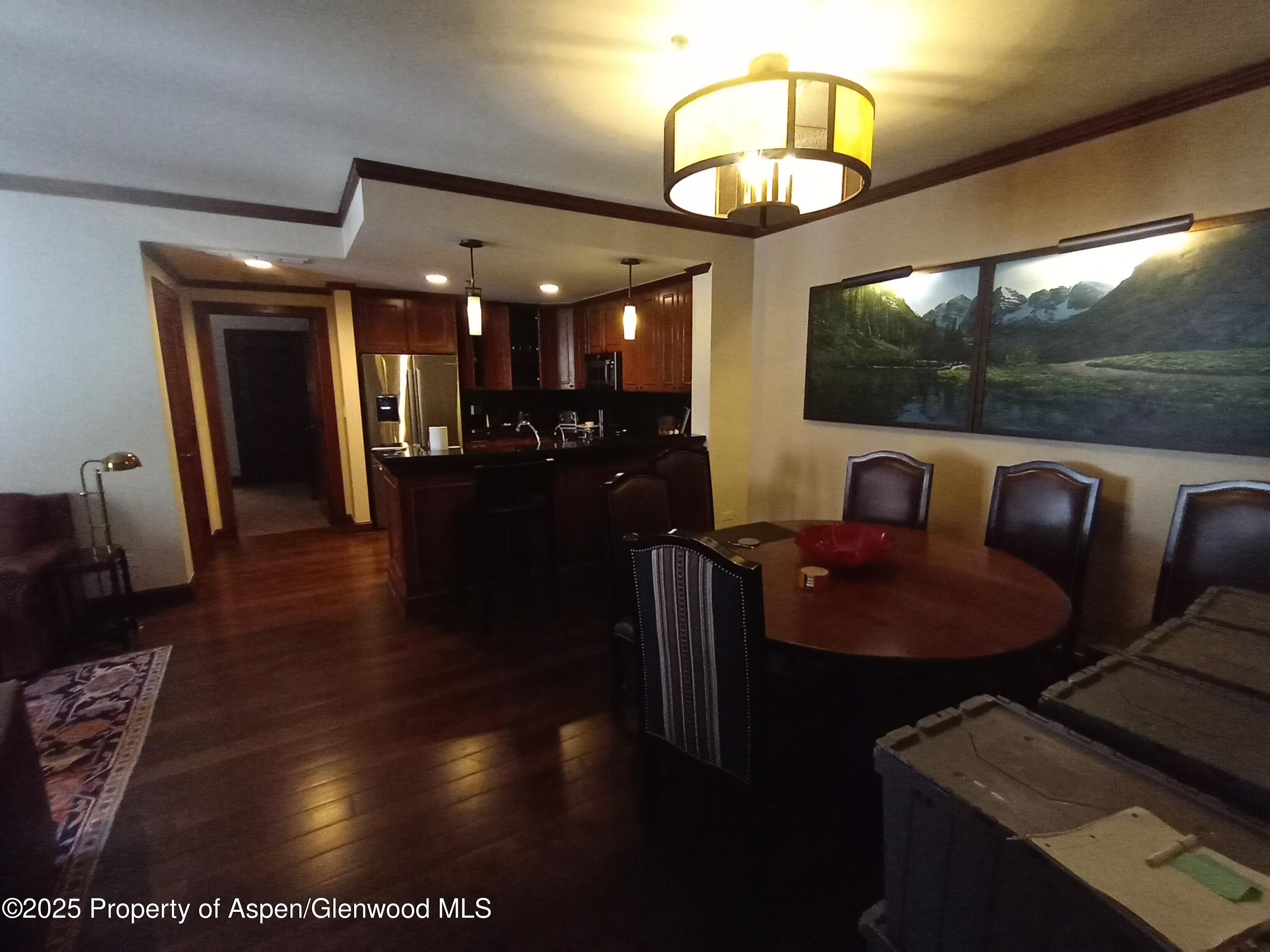 75 Prospector Road, Unit 8404 WINTER INTEREST #5 Aspen, CO 81611 - Photo 29 of 38 a living room with furniture and a large window