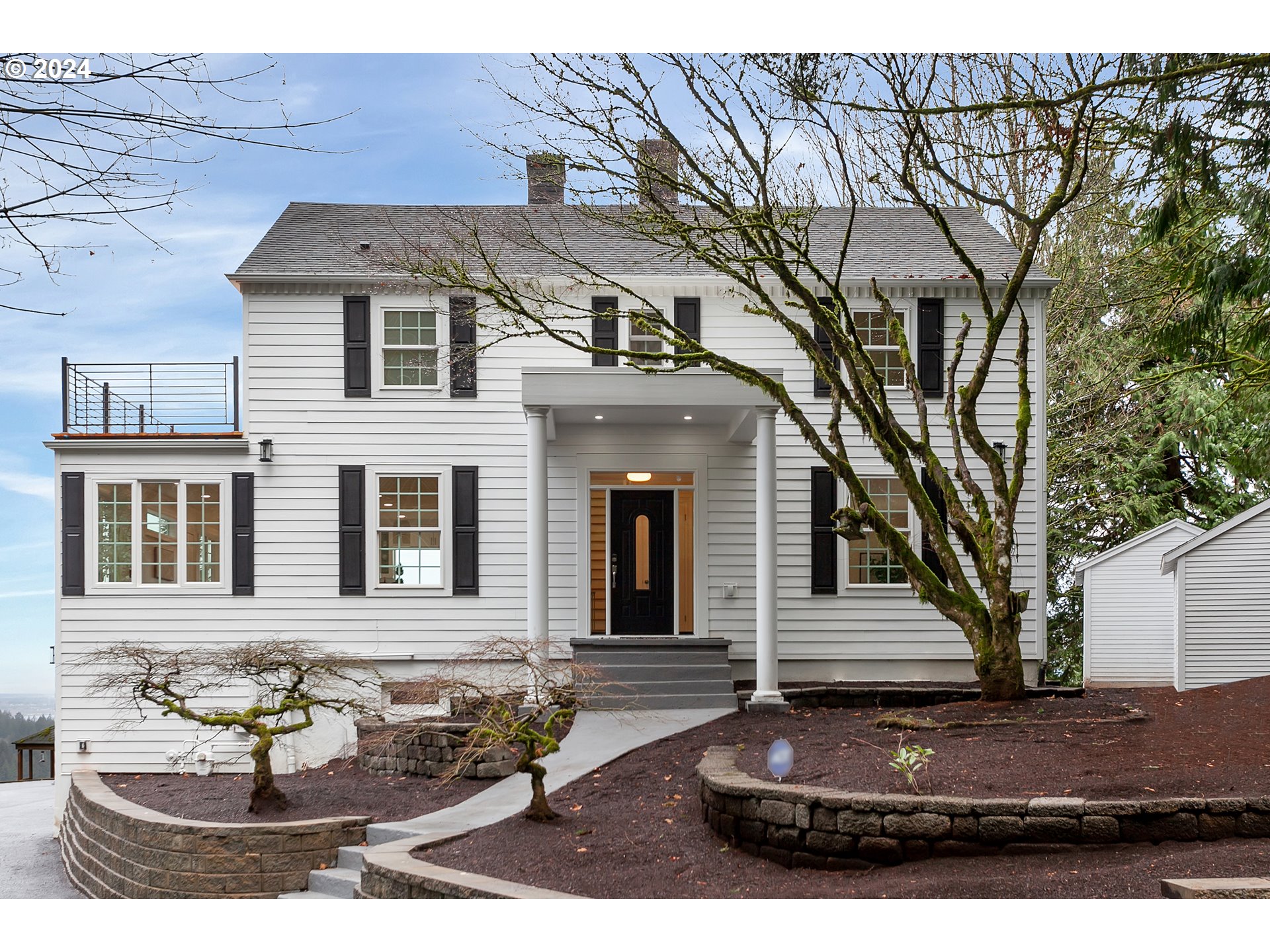 500 Northwest Greenleaf Road Portland, OR 97229 - Photo 1 of 3 a front view of a house with a yard
