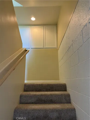 a view of a swimming pool with a yard