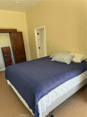 a view of a livingroom with a cabinets