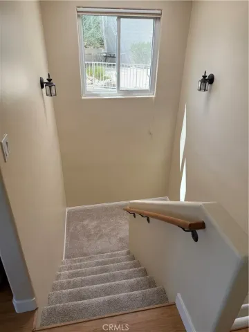 a bathroom with a glass door shower