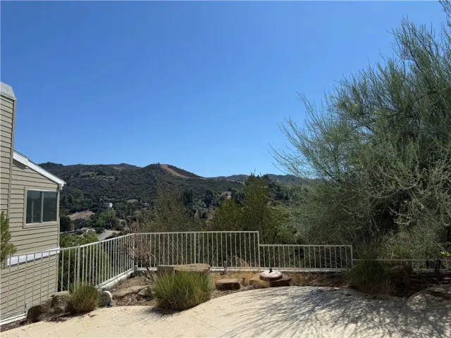a view of balcony with furniture