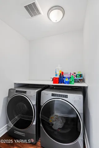 a utility room with dryer and washer