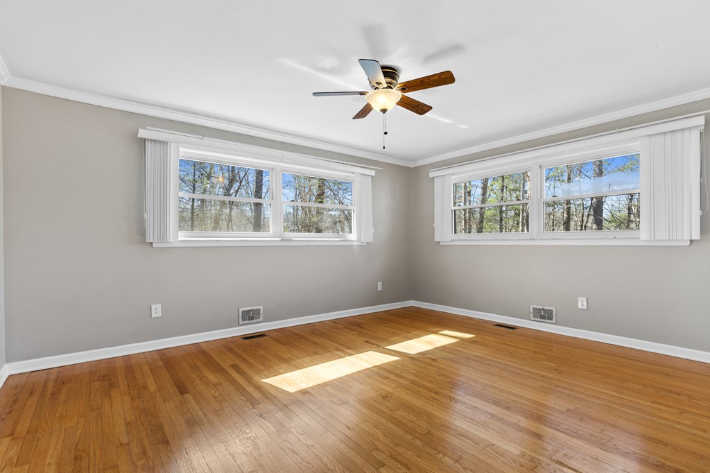 3920 Blue Ridge Drive Blue Ridge, GA 30513 - Photo 11 of 22 a view of an empty room with wooden floor and a window