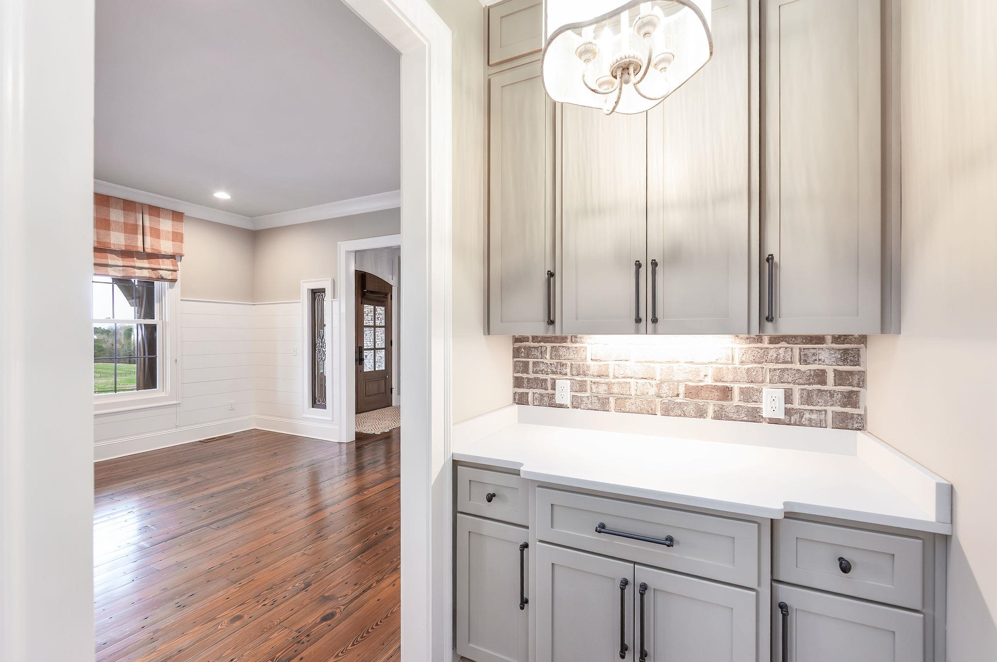 348 Countryside Drive Lexington, TN 38351 - Photo 19 of 39 a bathroom with a sink and a mirror