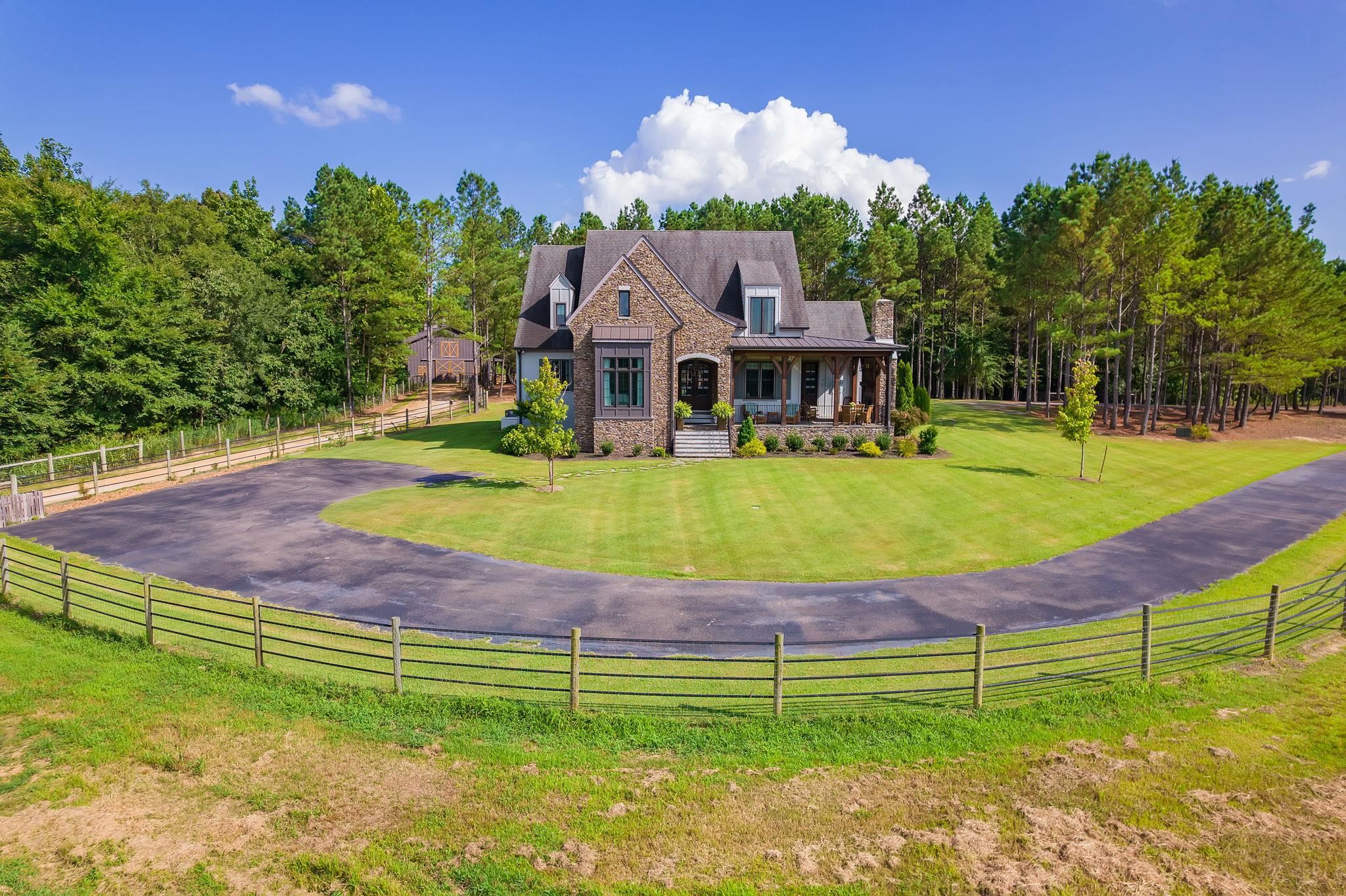 348 Countryside Drive Lexington, TN 38351 - Photo 2 of 39 a view of a house with a big yard