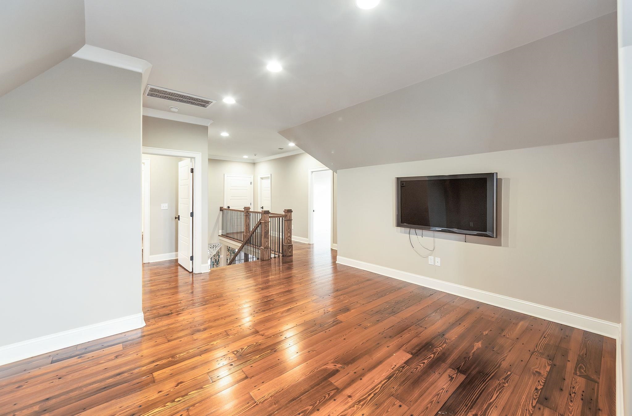 348 Countryside Drive Lexington, TN 38351 - Photo 25 of 39 a view of an empty room with wooden floor and a window