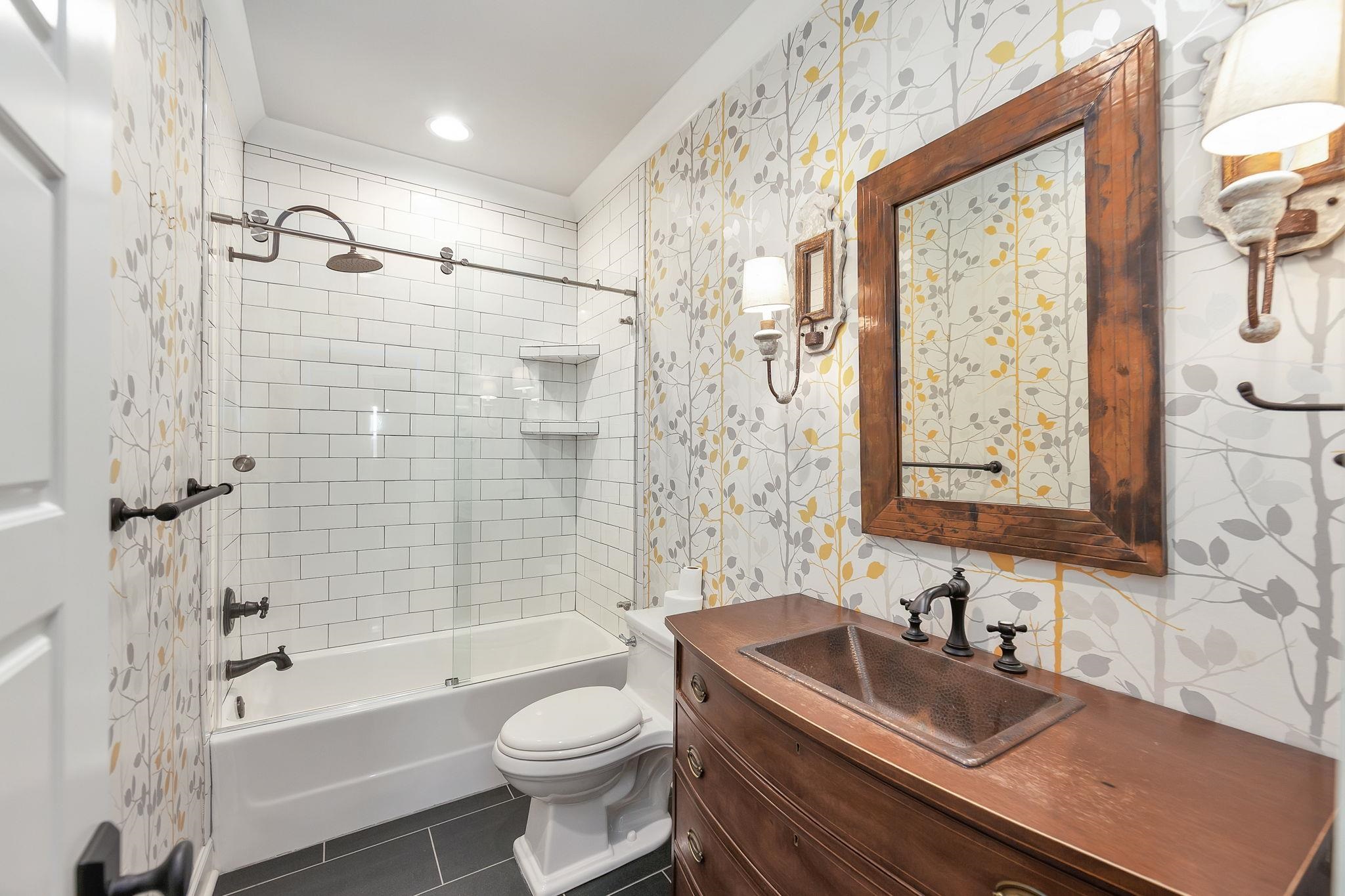 348 Countryside Drive Lexington, TN 38351 - Photo 27 of 39 a bathroom with a granite countertop sink toilet tub and shower