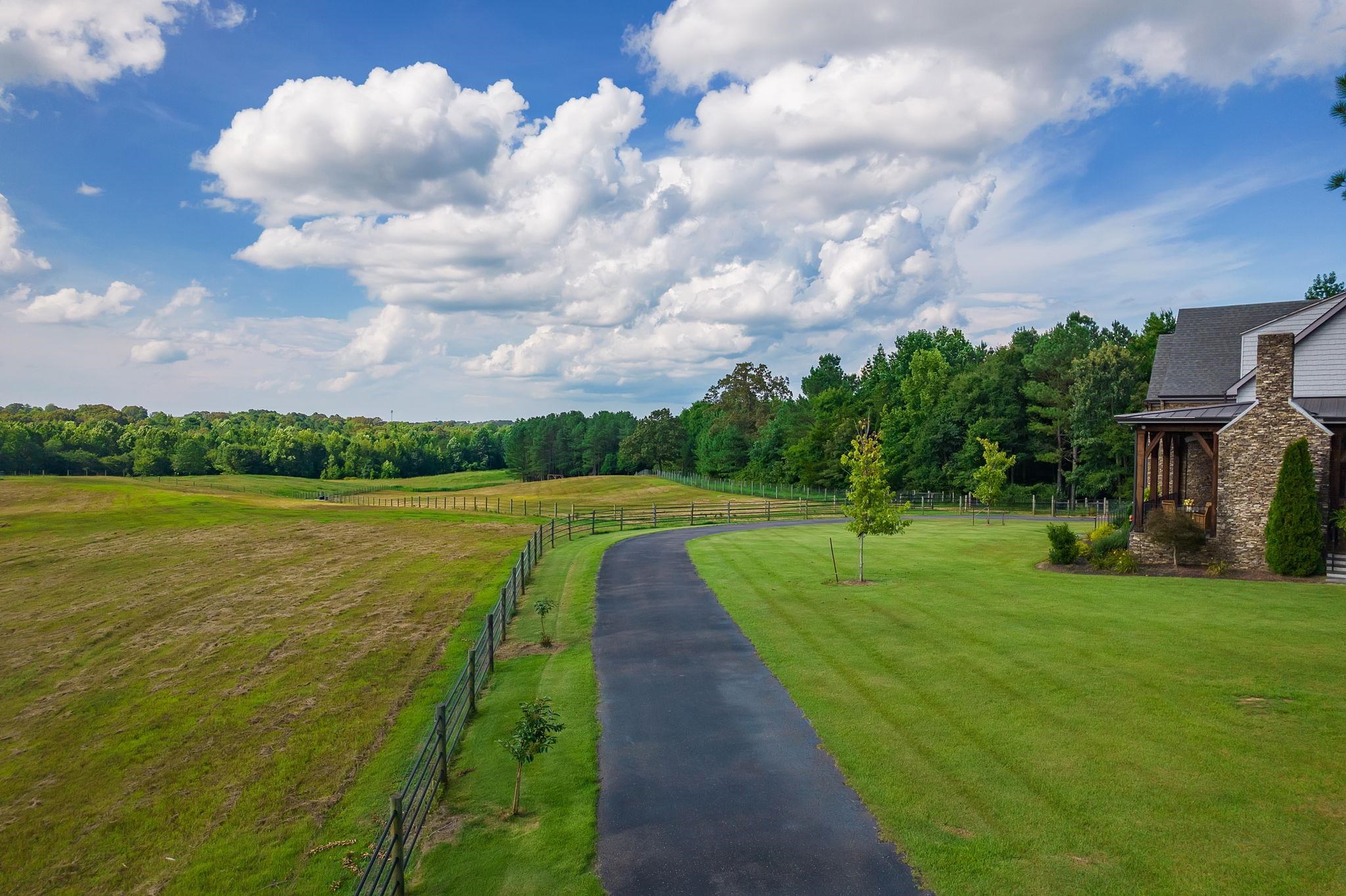 348 Countryside Drive Lexington, TN 38351 - Photo 36 of 39 a view of a lake with a big yard