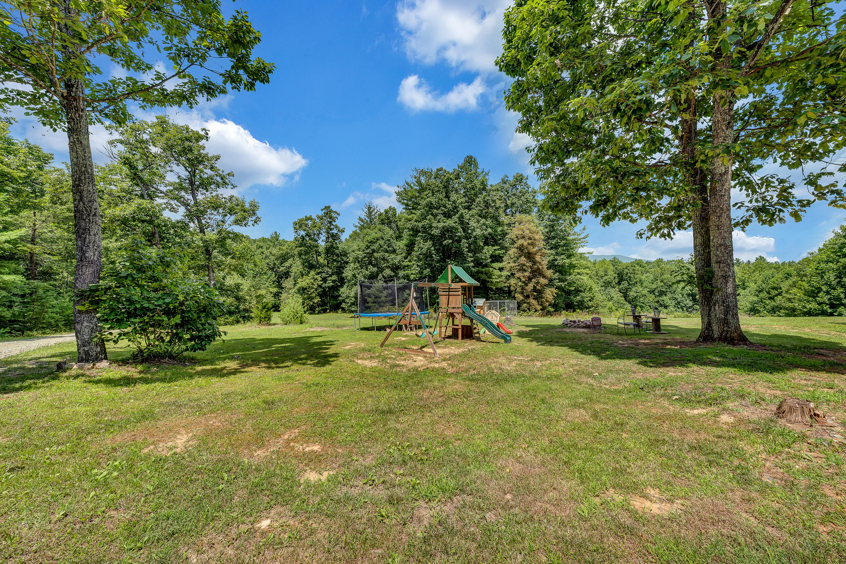 1145 Madcap Road Rocky Mount, VA 24151 - Photo 11 of 38 a swimming pool with wooden fence