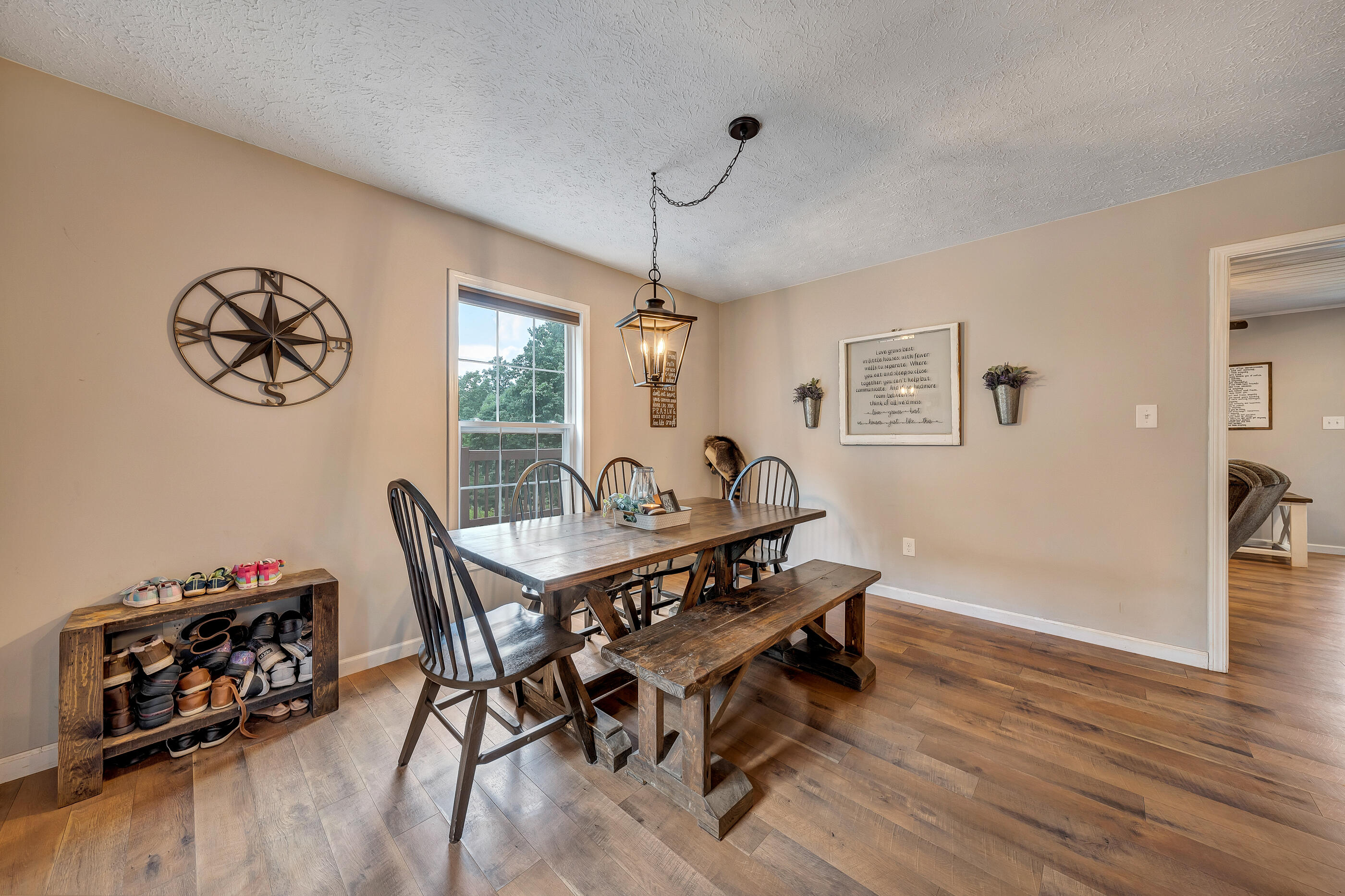 1145 Madcap Road Rocky Mount, VA 24151 - Photo 14 of 38 a view of a dining room with furniture window and wooden floor