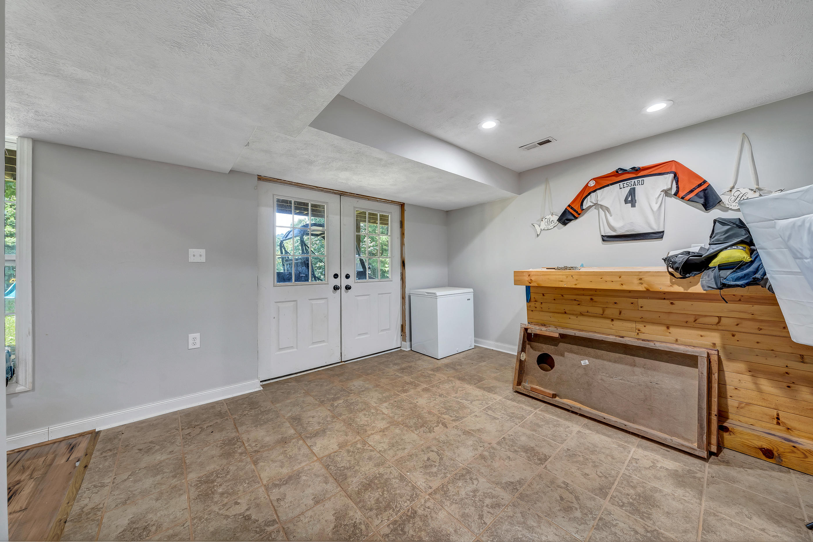 1145 Madcap Road Rocky Mount, VA 24151 - Photo 29 of 38 wooden floor with windows and cabinet in front of it
