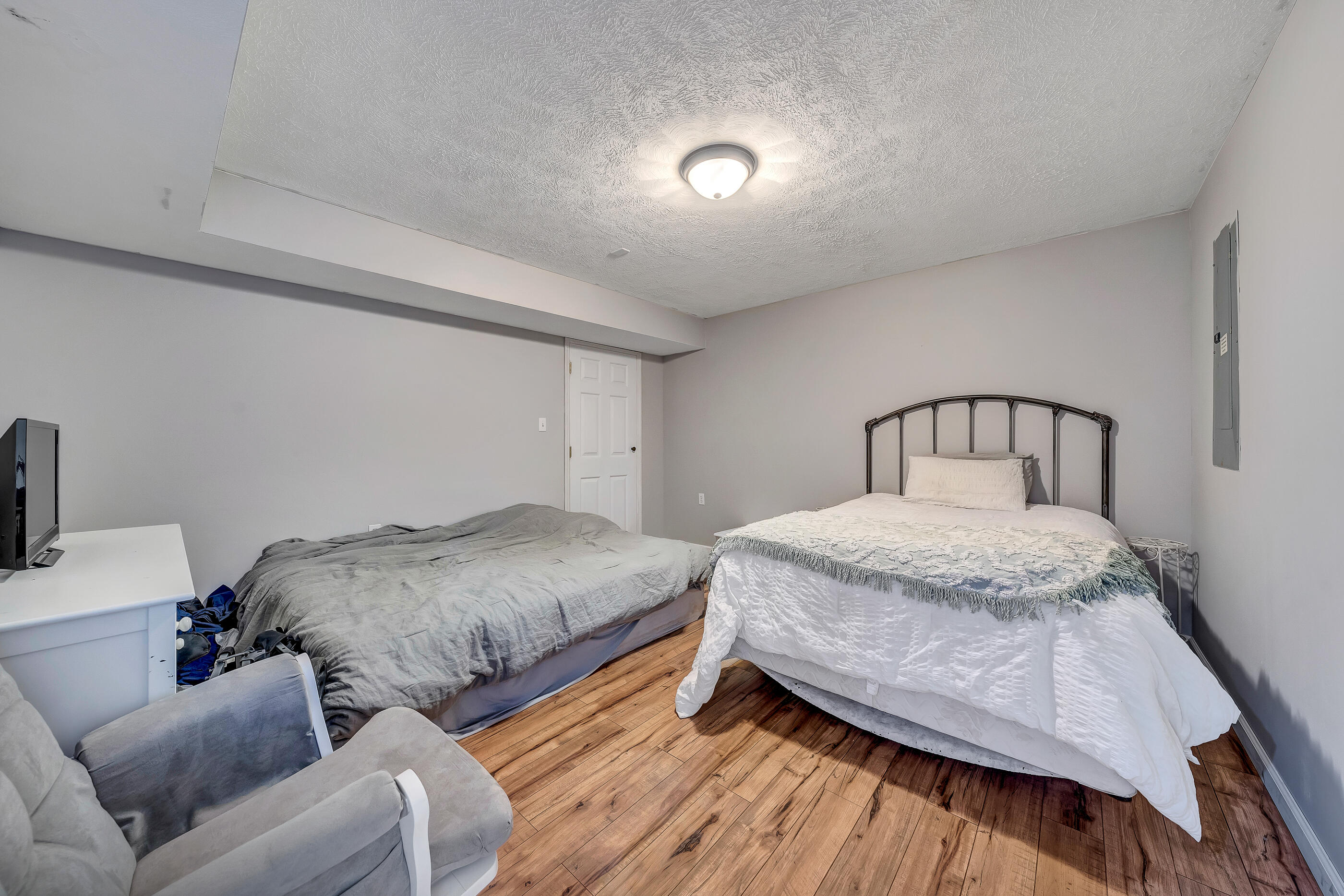 1145 Madcap Road Rocky Mount, VA 24151 - Photo 30 of 38 a bedroom with a bed and a mirror