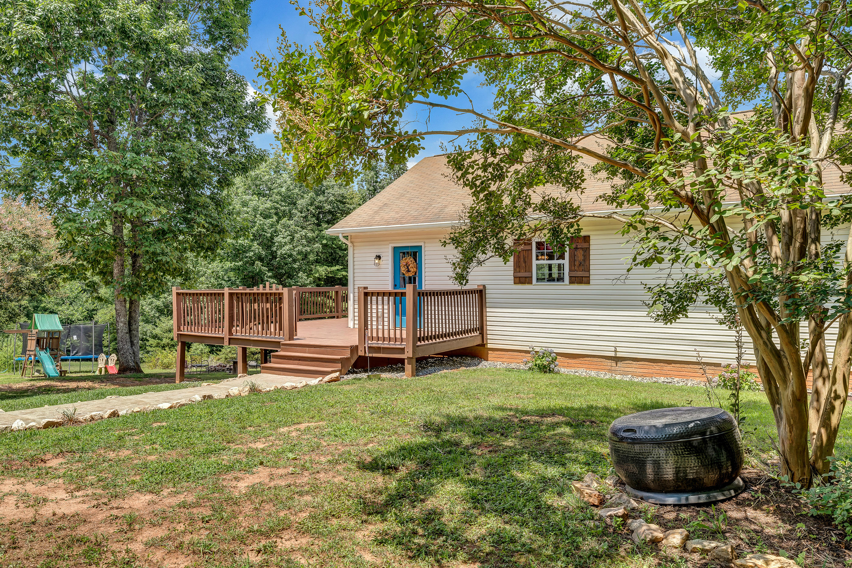 1145 Madcap Road Rocky Mount, VA 24151 - Photo 4 of 38 a house view with a sitting space and garden