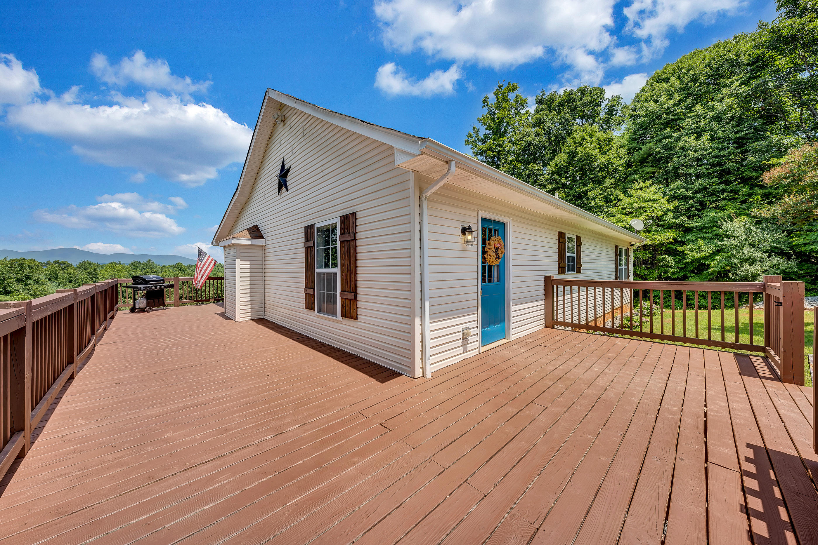 1145 Madcap Road Rocky Mount, VA 24151 - Photo 9 of 38 a view of backyard with a deck