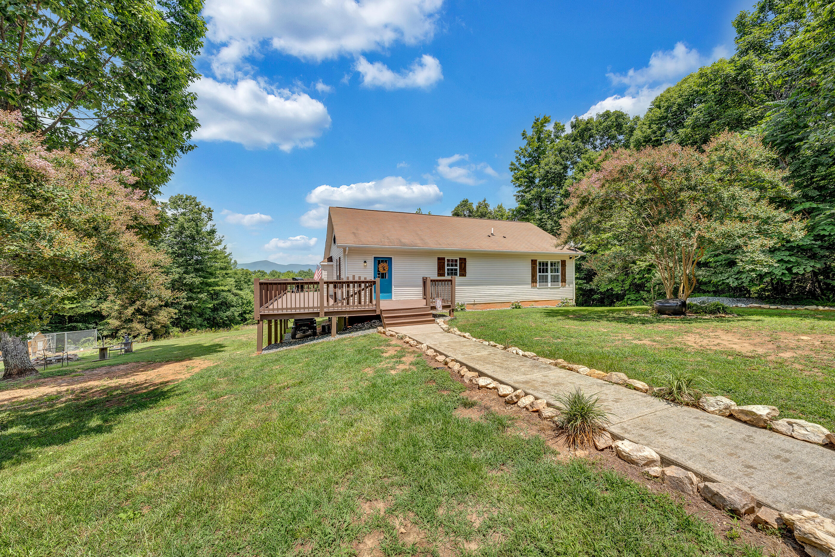 1145 Madcap Road Rocky Mount, VA 24151 - Photo 10 of 38 a house view with a sitting space and garden