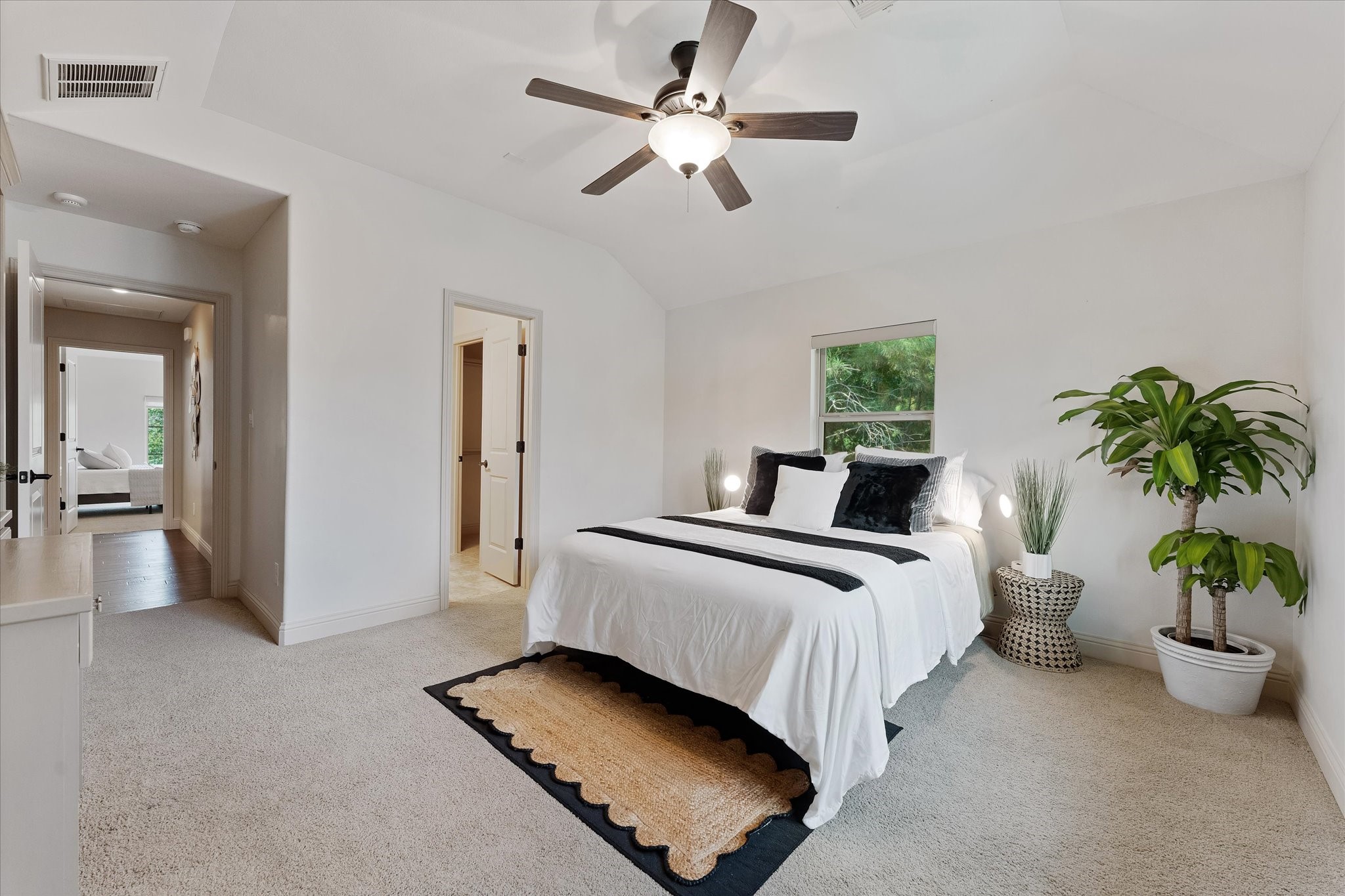 19 Paloma Bend Place Spring, TX 77389 - Photo 37 of 50 Secondary bedroom #2 on the 2nd floor overlooking the back yard.