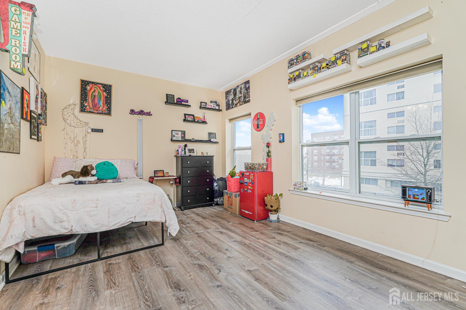 358 Rector Street, Unit 308 Perth Amboy, NJ 08861 - Photo 20 of 29 a bedroom with furniture and a window