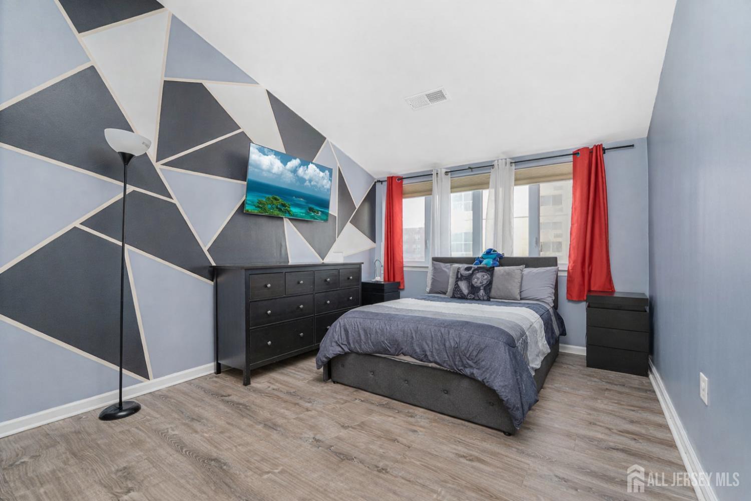 358 Rector Street, Unit 308 Perth Amboy, NJ 08861 - Photo 24 of 29 a bedroom with a bed and a window