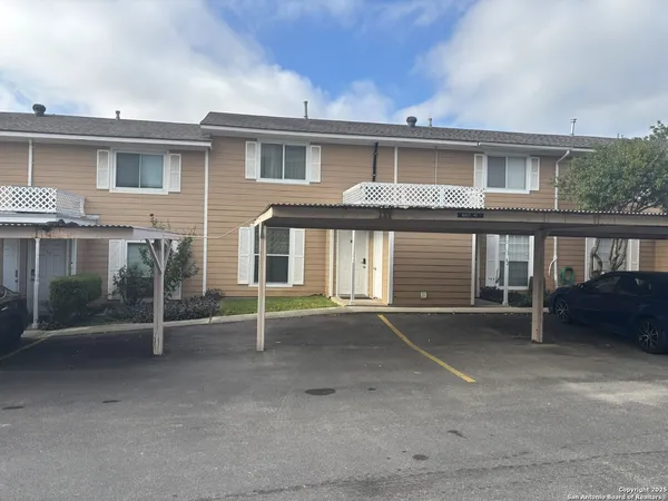 a front view of a house with yard