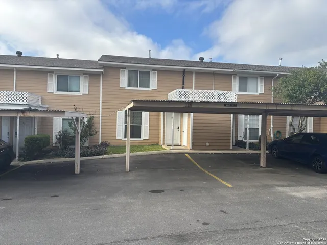 a front view of a house with yard