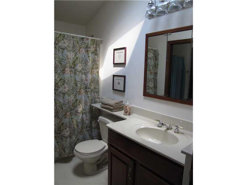 2810 Ipnar Road North Huntingdon, PA 15642 - Photo 13 of 25 Full Bath. The second part of the back to back full bath, houses the shared toilet as well as a tub, shower and sink. Triple storage cabinet/mirrors. You can see the sunlight pouring through the skylight! Pristine condition!