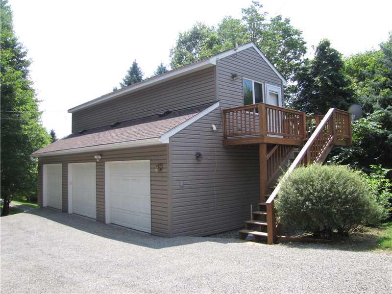 2810 Ipnar Road North Huntingdon, PA 15642 - Photo 20 of 25 Parking Lot/Garage. The 3 car detached garage with electric and a large finished second floor with heat and electric. Window AC. Make plumbing upgrades and you have a potential MIL suite or a space for adult children returning home to live! Man door is under the deck.