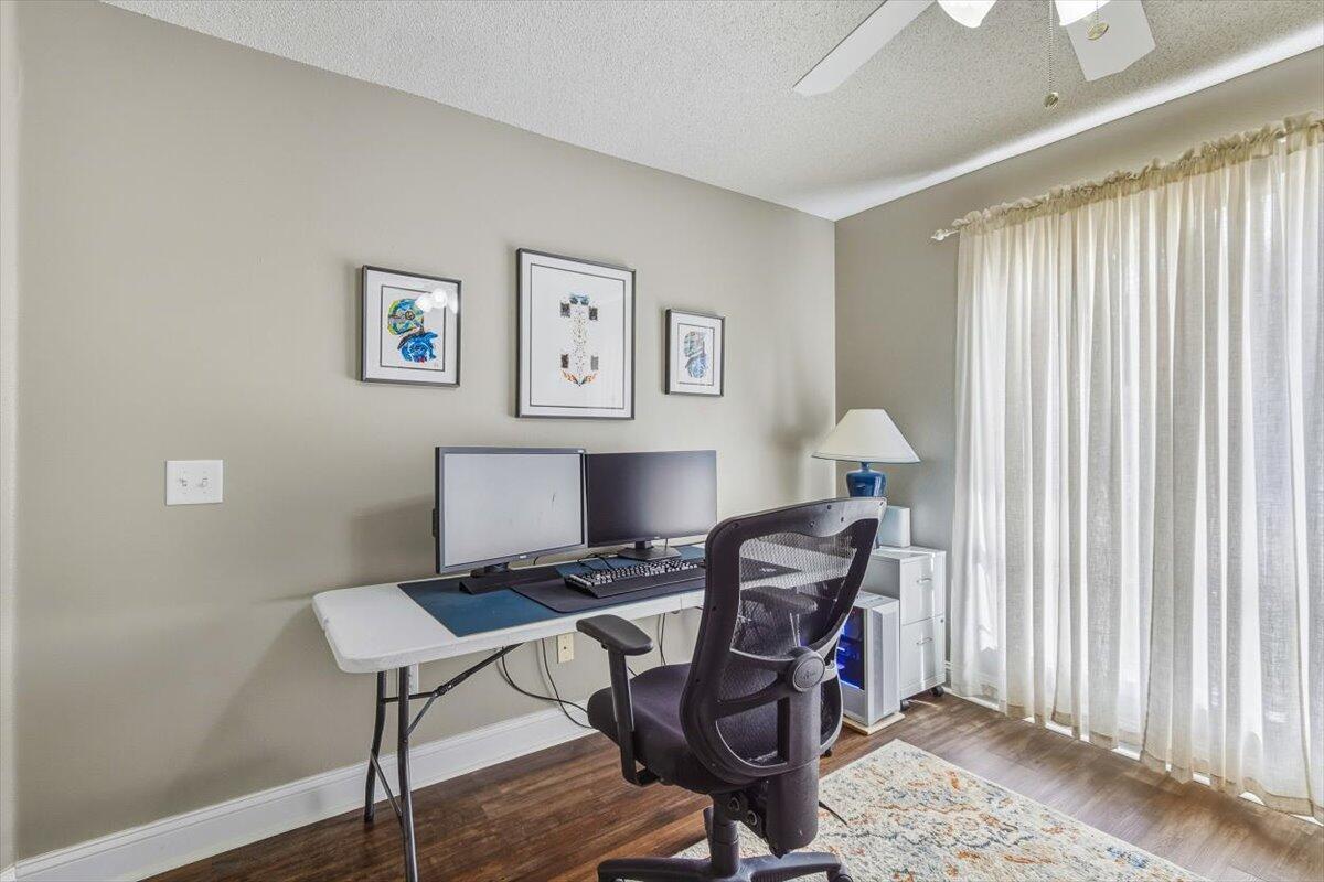 486 Jillian Drive Crestview, FL 32536 - Photo 12 of 44 a view of a workspace with furniture and a window