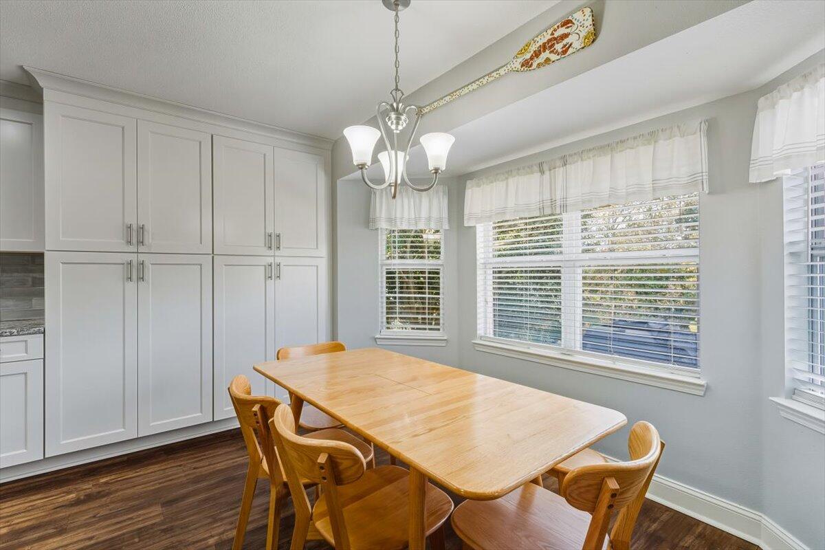 486 Jillian Drive Crestview, FL 32536 - Photo 31 of 44 a view of a dining room with furniture window and wooden floor