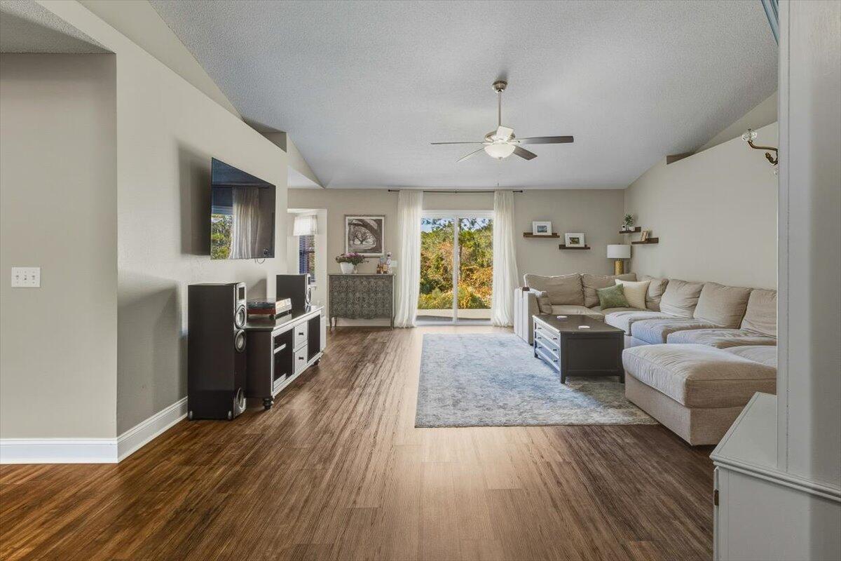 486 Jillian Drive Crestview, FL 32536 - Photo 4 of 44 a living room with furniture or couch and a wooden floor