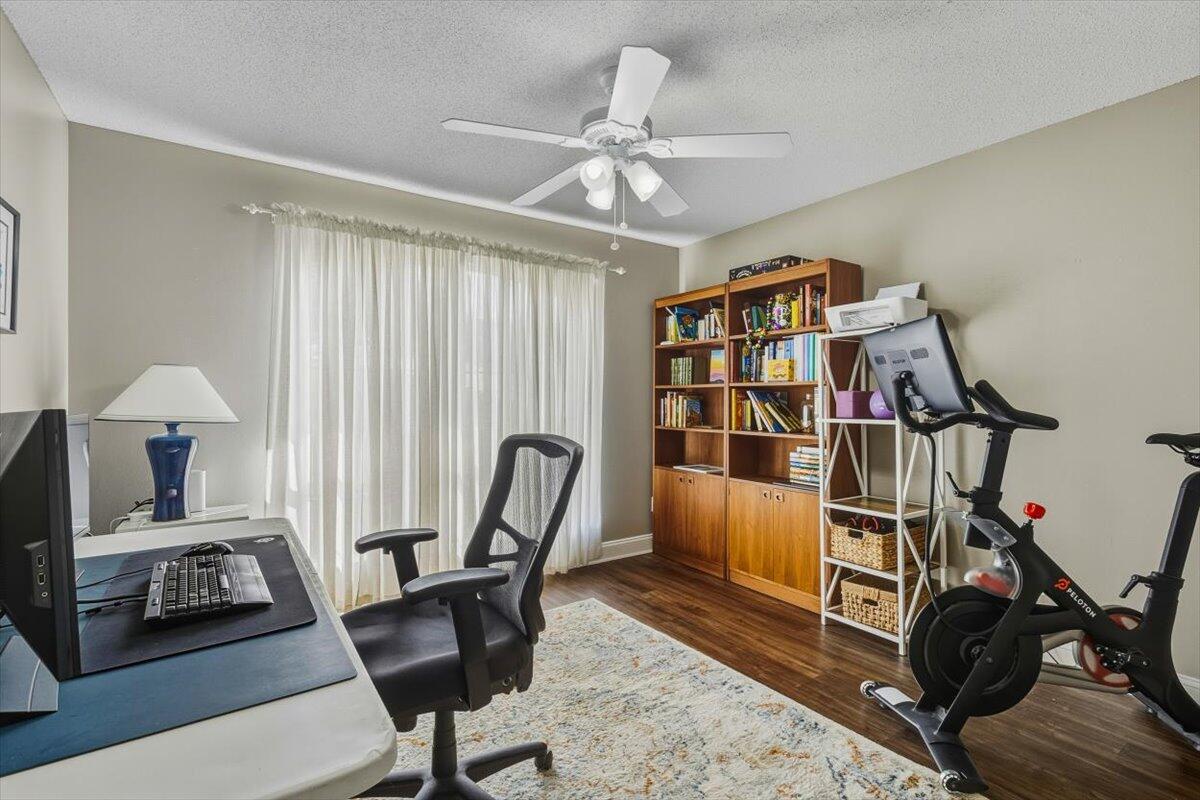 486 Jillian Drive Crestview, FL 32536 - Photo 9 of 44 a view of a workspace with furniture and a window